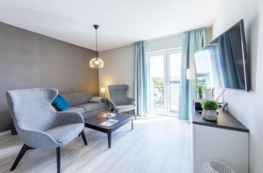 Boddenperle - 5-Sterne-Ferienwohnung mit Ostbalkon, 2 Bädern & Strandhaus-Charme in Wustrow